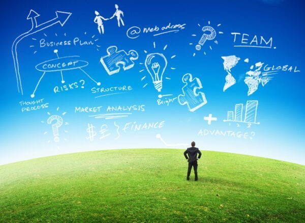 19590194 - business planning concept, businessman looking at plans in the sky