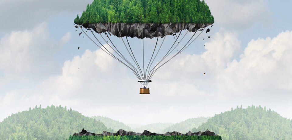 Imagination concept as a person lifting off with a detached top of a mountain floating up to the sky as a hot air balloon as a metaphor for the power of imagining traveling and dreaming of moving mountains.