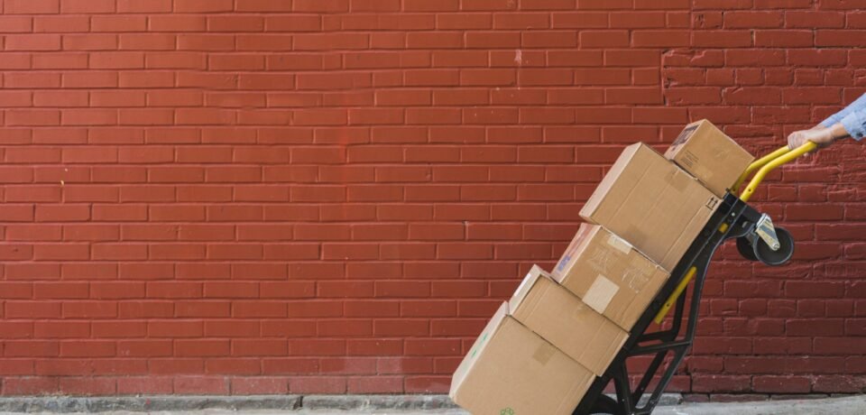 shipping-boxes-in-front-of-red-brick_4460x4460 shipping-boxes-in-front-of-red-brick_4460x4460